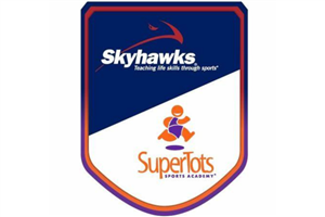 shield with blue and orange border top is dark blue back ground with word skyhawk lower half is white background with word supertots