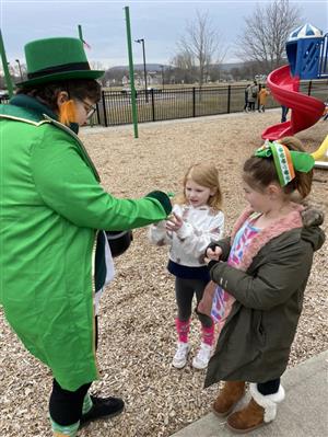 picture of children collecting prize from leprechaun